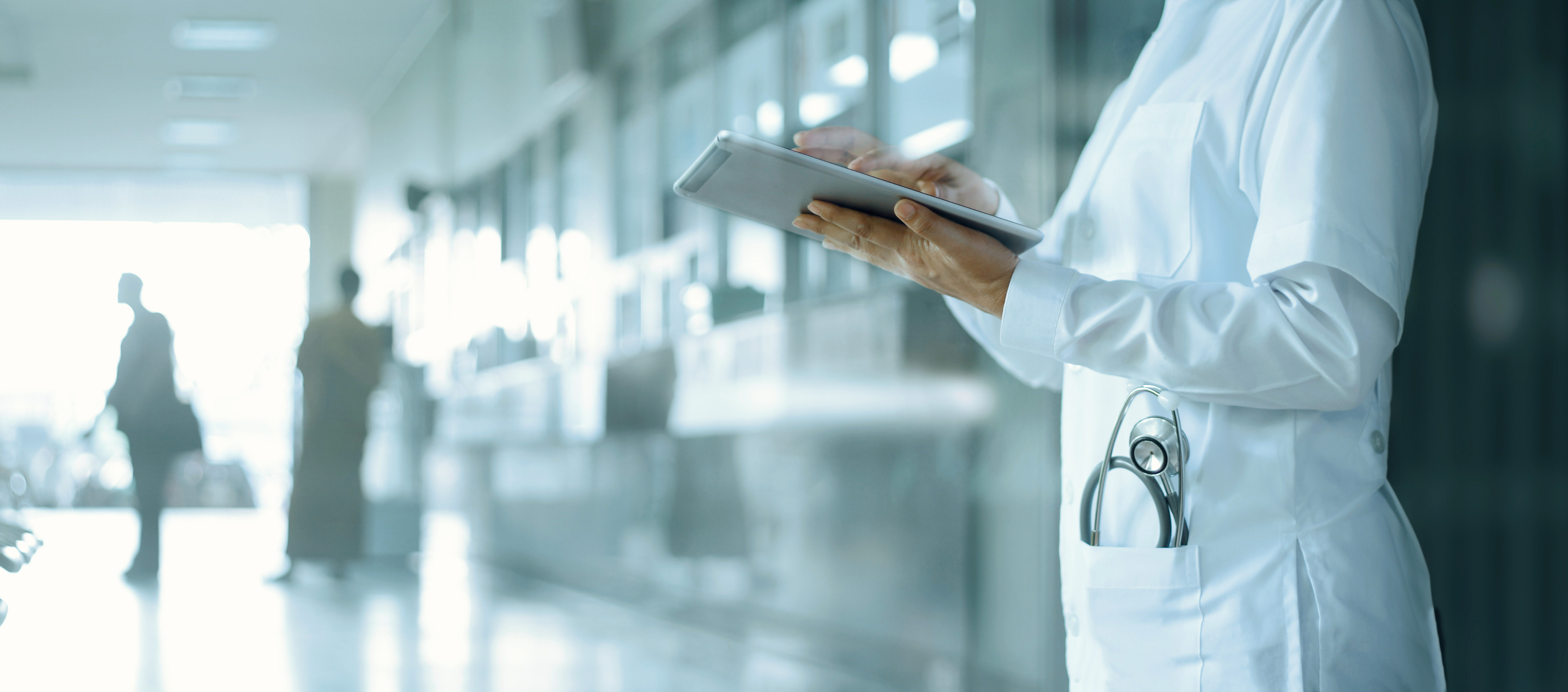 Healthcare professional using a tablet